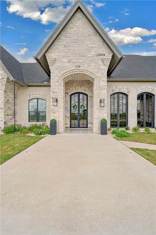 a view of a livingroom with furniture and a fireplace