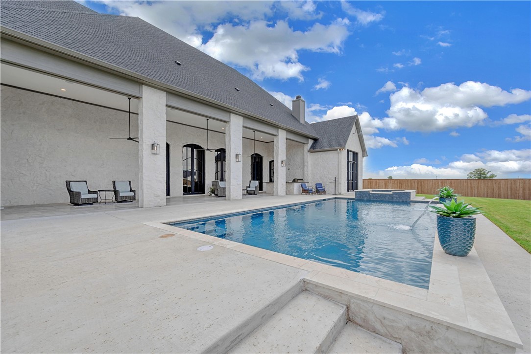 117 Iris Street Lorena, TX 76655 - Photo 63 of 82 a view of a swimming pool with an outdoor seating