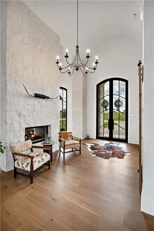 a view of a livingroom with furniture and window
