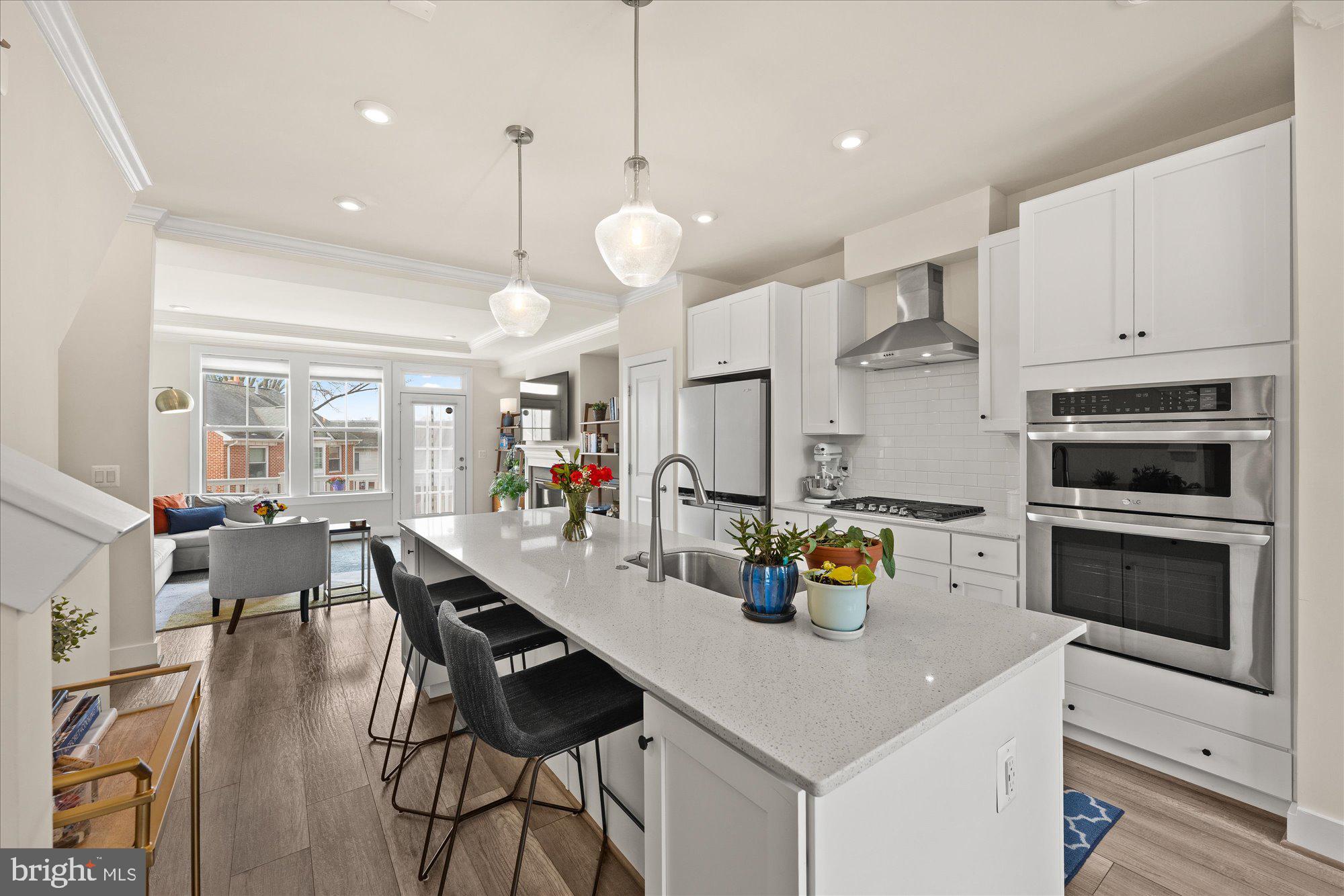 2236 South Glebe Road Arlington, VA 22206 - Photo 6 of 19 a kitchen with a sink a counter space appliances and cabinets