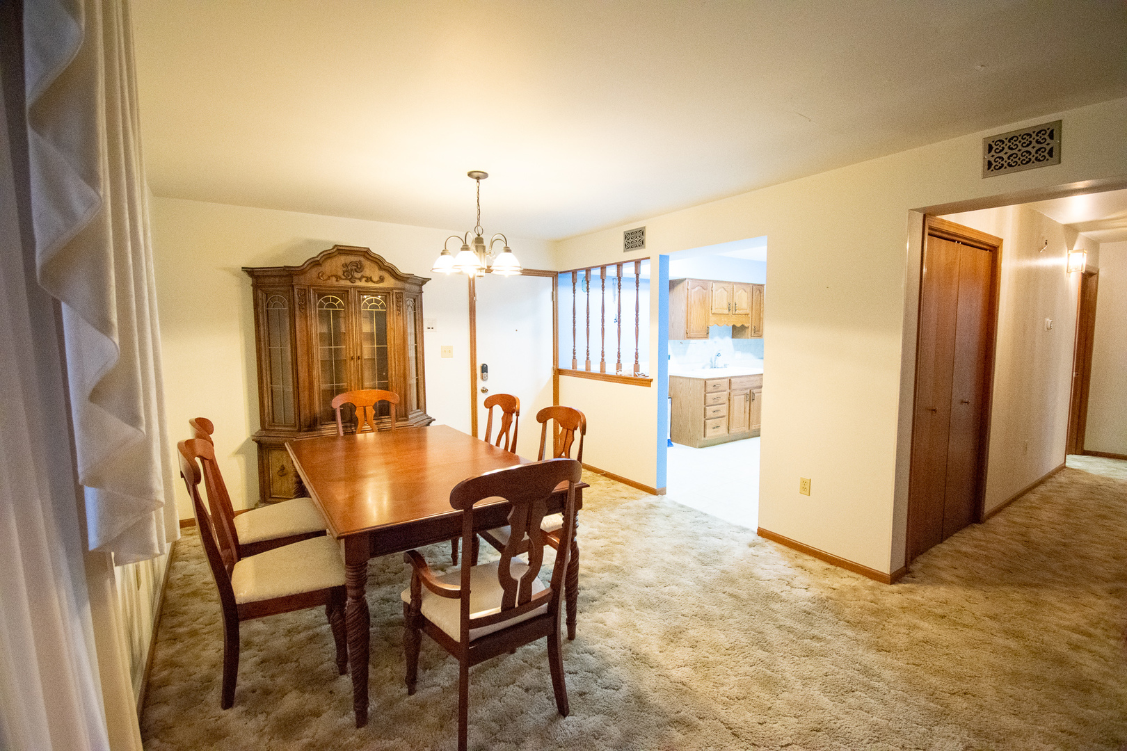 18300 Myrtle Court, Unit 3A Lansing, IL 60438 - Photo 14 of 20 a view of a dining room with furniture and wooden floor