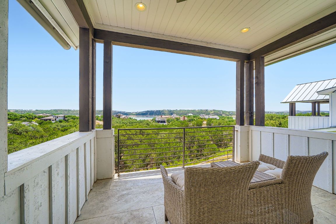 19517 Flying J Boulevard, Unit 8 Spicewood, TX 78669 - Photo 27 of 29 a view of balcony with furniture