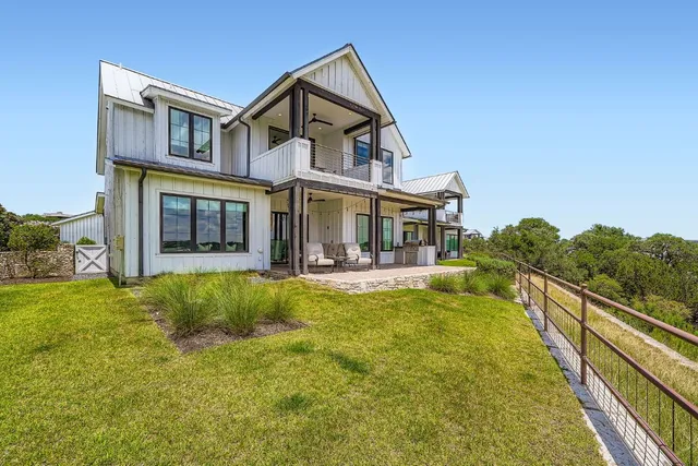 a view of a house with a swimming pool