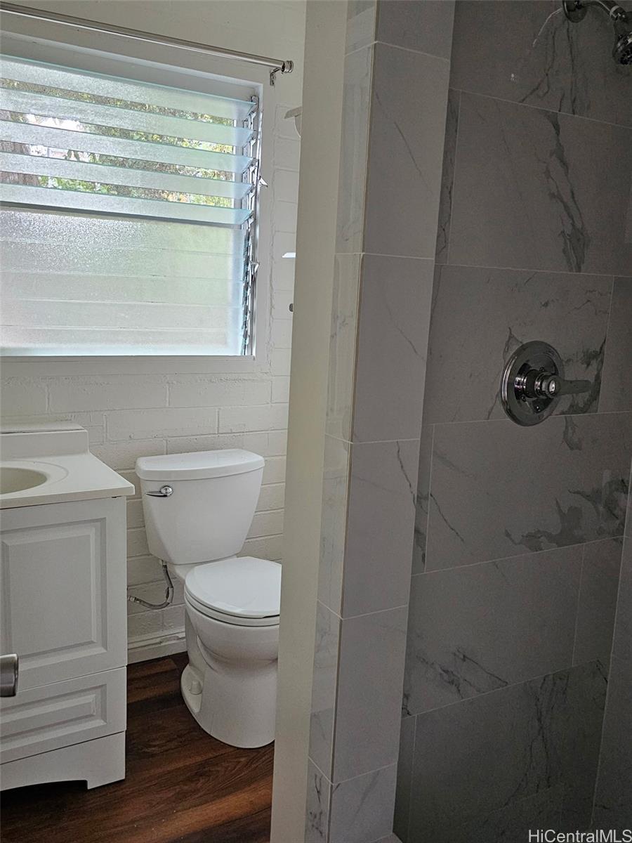 146 Prospect Street, Unit B Honolulu, HI 96813 - Photo 3 of 4 a bathroom with a toilet and a vanity