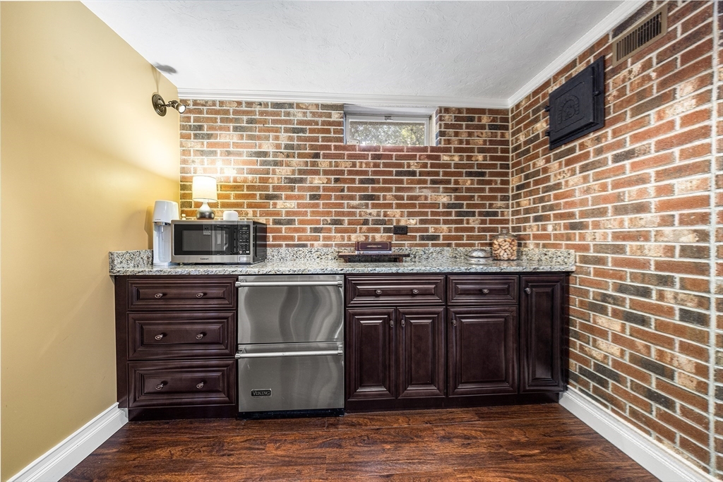 23 Landers Road Stoneham, MA 02180 - Photo 13 of 42 a kitchen with a sink and cabinets