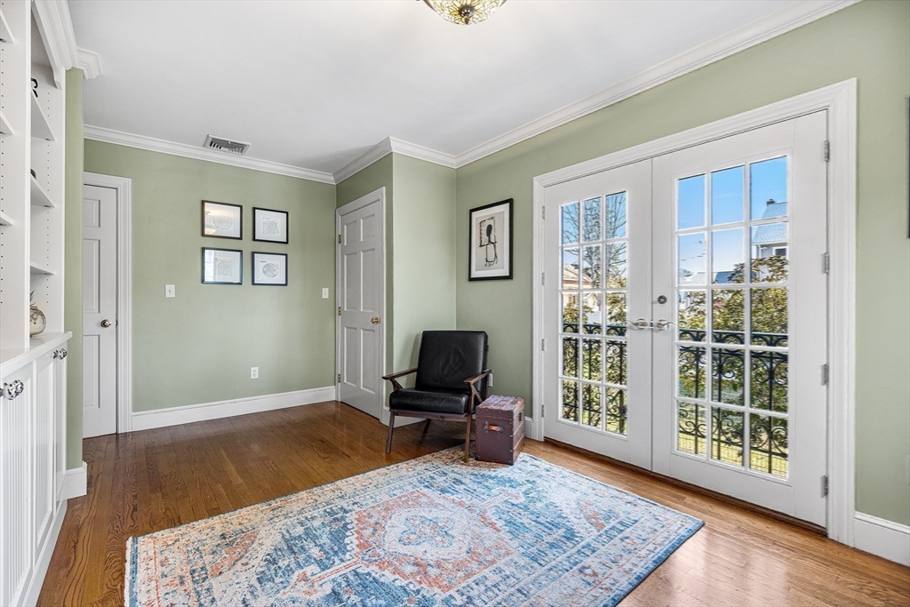 23 Landers Road Stoneham, MA 02180 - Photo 18 of 42 a living room with a couch and a window
