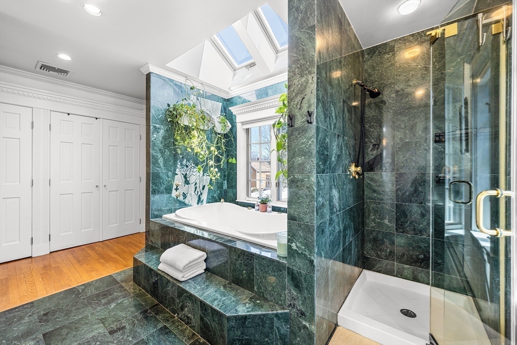 23 Landers Road Stoneham, MA 02180 - Photo 23 of 42 a bathroom with a sink toilet and shower