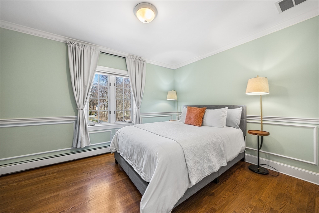 23 Landers Road Stoneham, MA 02180 - Photo 26 of 42 a bedroom with a bed and a window