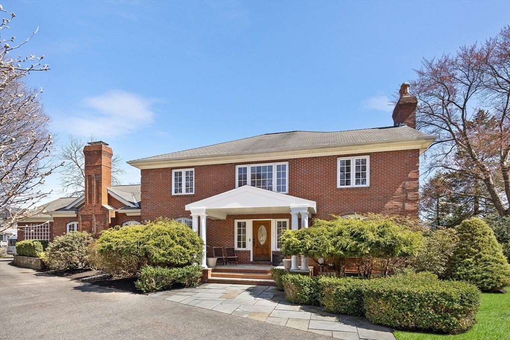 23 Landers Road Stoneham, MA 02180 - Photo 33 of 42 a front view of a house with a garden