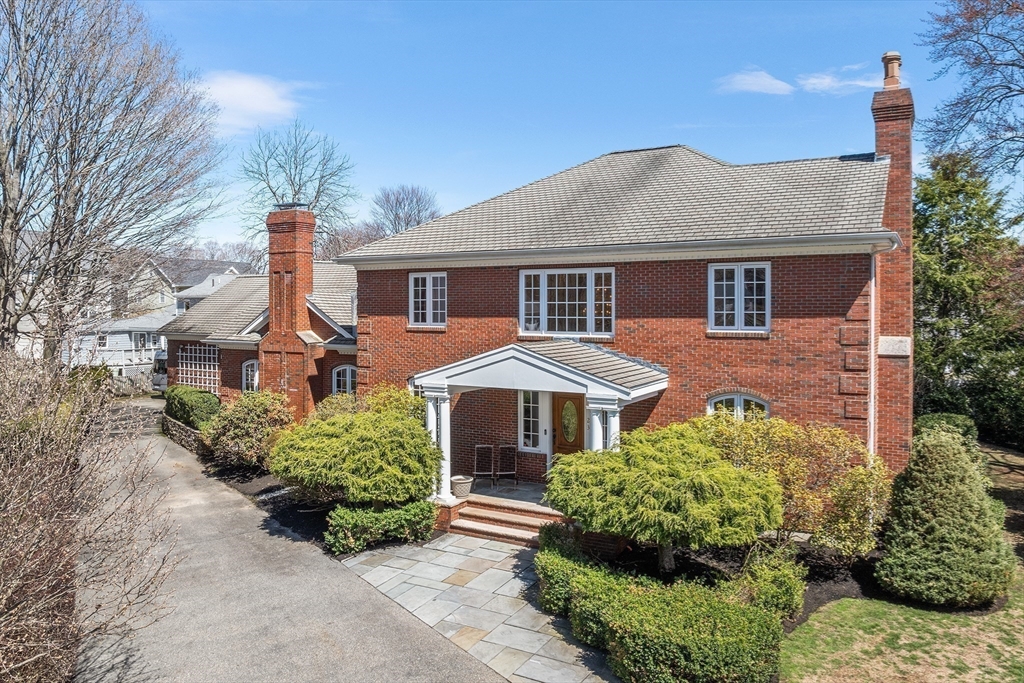 23 Landers Road Stoneham, MA 02180 - Photo 34 of 42 a front view of a house with a yard