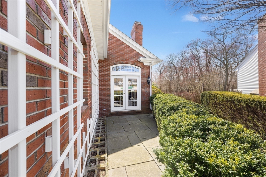 23 Landers Road Stoneham, MA 02180 - Photo 39 of 42 a view of a building with a garden