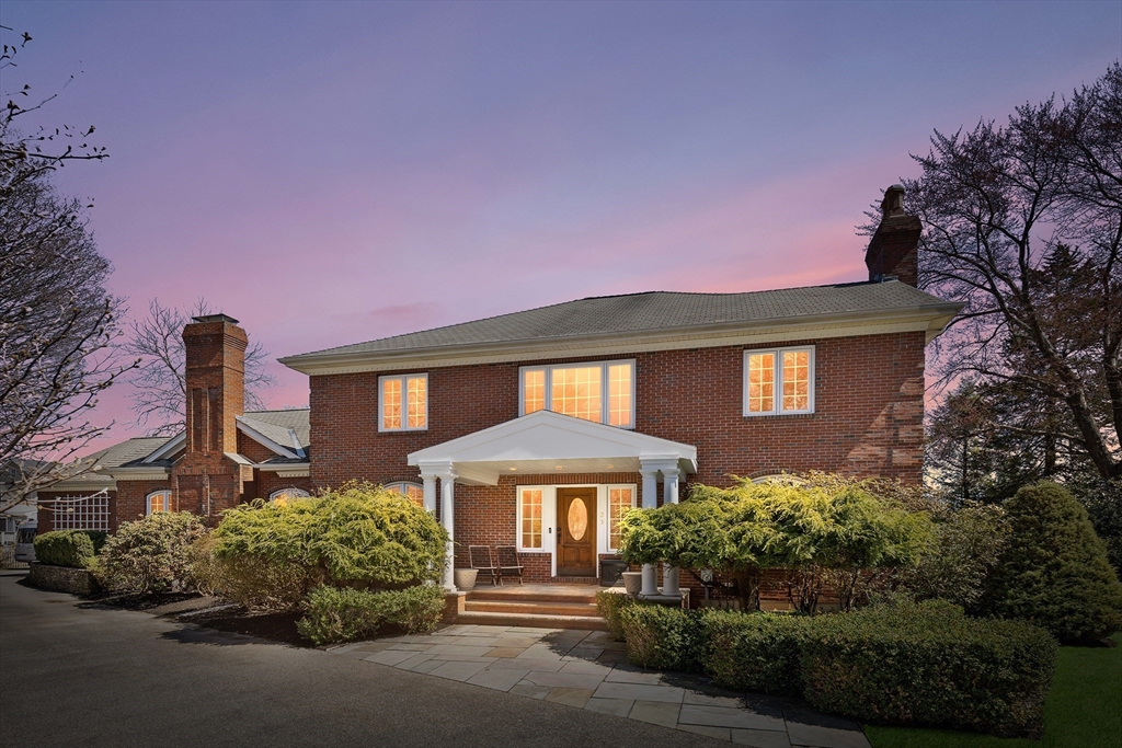 23 Landers Road Stoneham, MA 02180 - Photo 41 of 42 a front view of a house with a yard