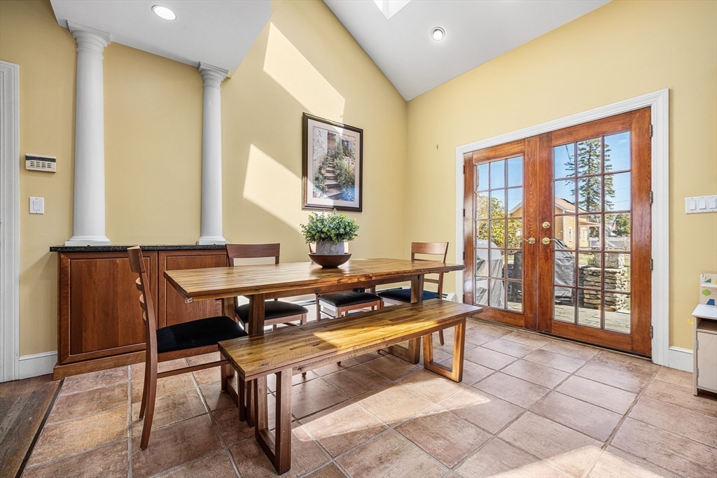 23 Landers Road Stoneham, MA 02180 - Photo 9 of 42 a reading room with furniture a large window and a potted plant
