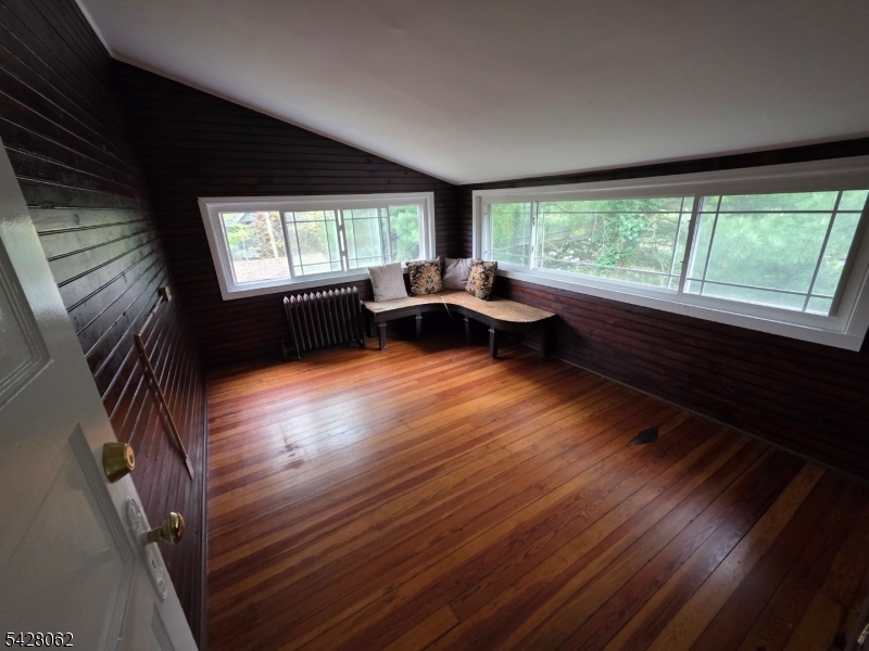 71 Montclair Avenue Montclair, NJ 07042 - Photo 16 of 25 a living room with furniture and a large window