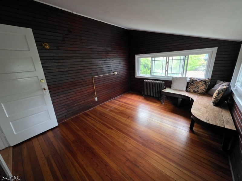 71 Montclair Avenue Montclair, NJ 07042 - Photo 17 of 25 a view of a living room and hardwood floor