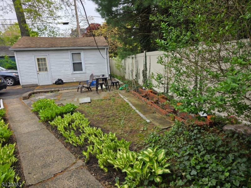 71 Montclair Avenue Montclair, NJ 07042 - Photo 3 of 25 a backyard of a house with seating space