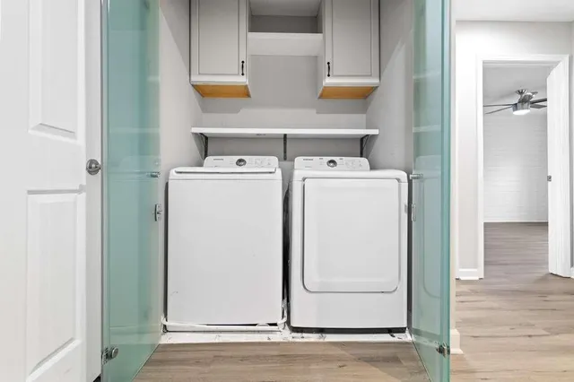 a utility room with dryer and washer
