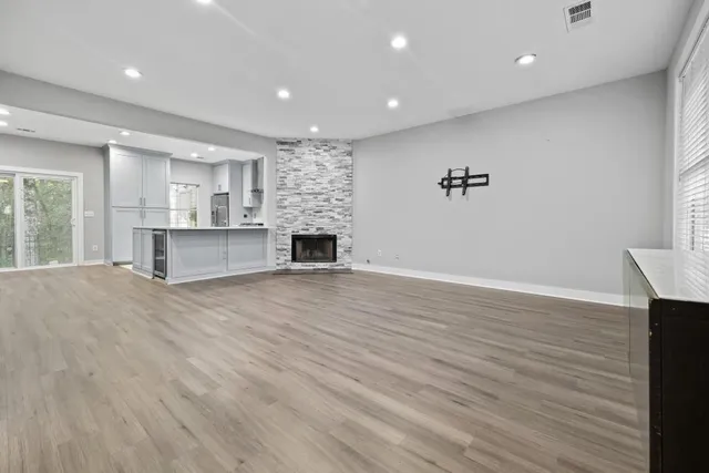 a view of kitchen with cabinets and wooden floor