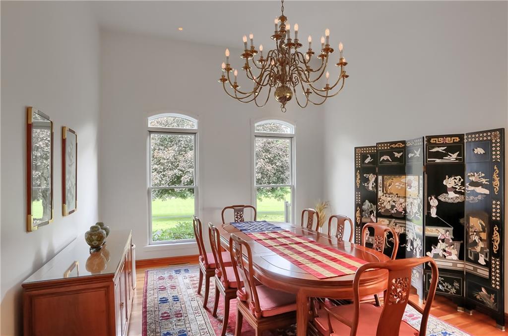180 Brandon Road Slippery Rock, PA 16057 - Photo 24 of 50 LARGE formal dining room with vaulted ceilings and large windows.