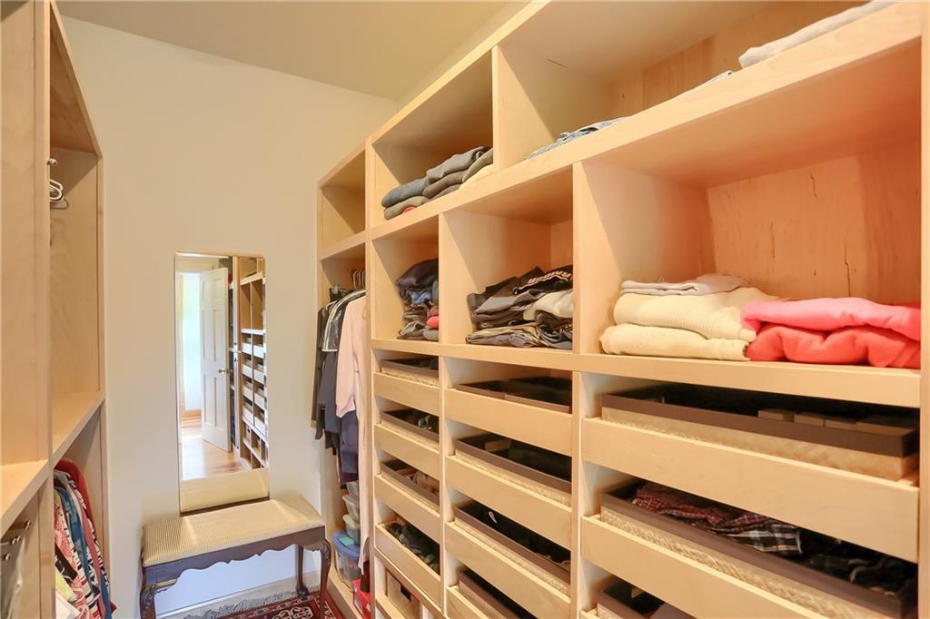 180 Brandon Road Slippery Rock, PA 16057 - Photo 31 of 50 Master Bedroom walk-in closet with custom pull outs for clothing, shoes, purses, and more additional storage for ties, belts and more!