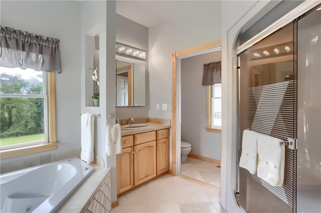 180 Brandon Road Slippery Rock, PA 16057 - Photo 32 of 50 Large Full master bathroom includes jet tub, private shower, and toilet complete with separate door.
