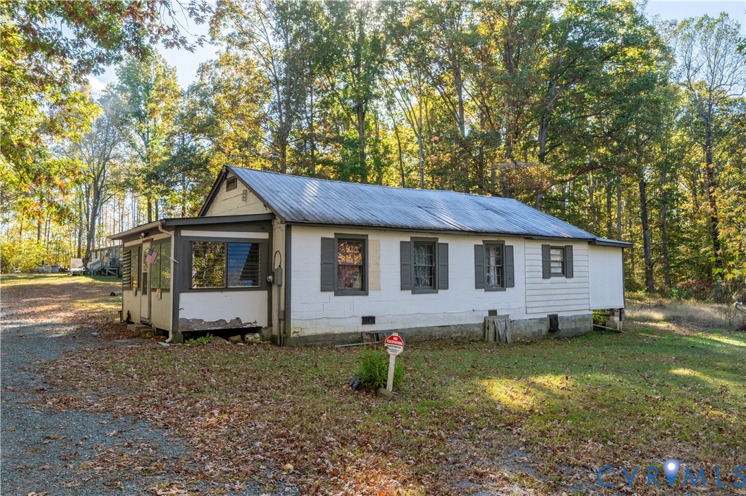 3490 Hadensville-Fife Road Goochland, VA 23063 - Photo 3 of 4 View of side of home featuring a metal roof, crawl