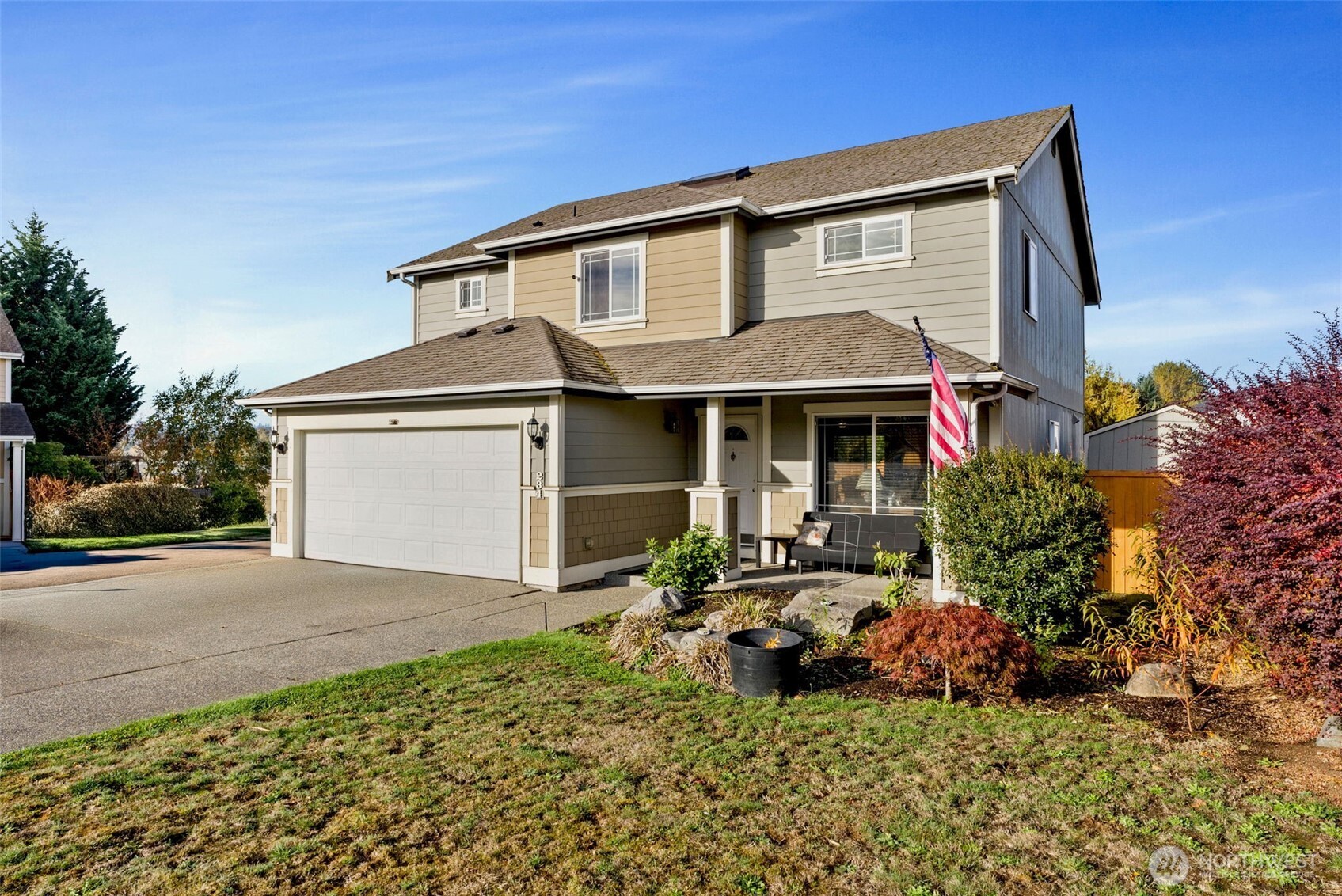 234 Wind River Drive Chehalis, WA 98532 - Photo 4 of 33 a front view of a house with a garden and yard