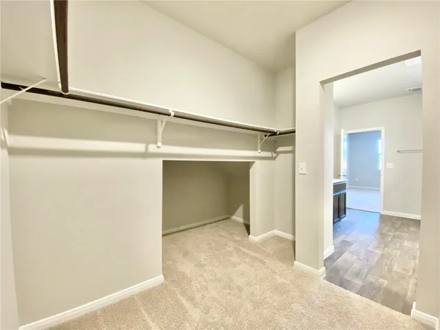 a view of a big room with wooden floor