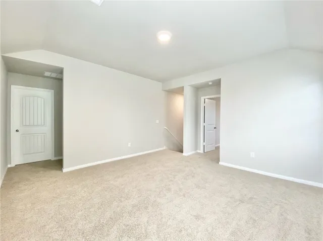 an empty room with an entryway