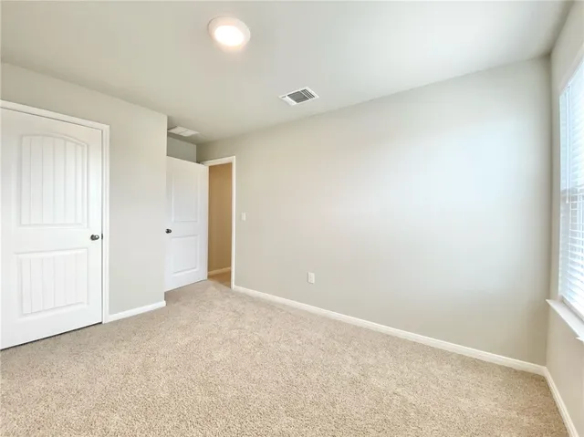 an empty room with an entryway