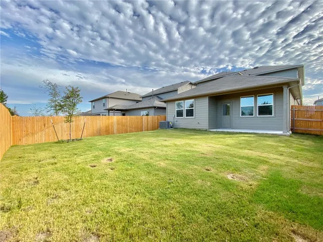 a front view of house with yard and seating