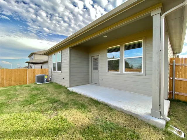 a view of back yard of the house