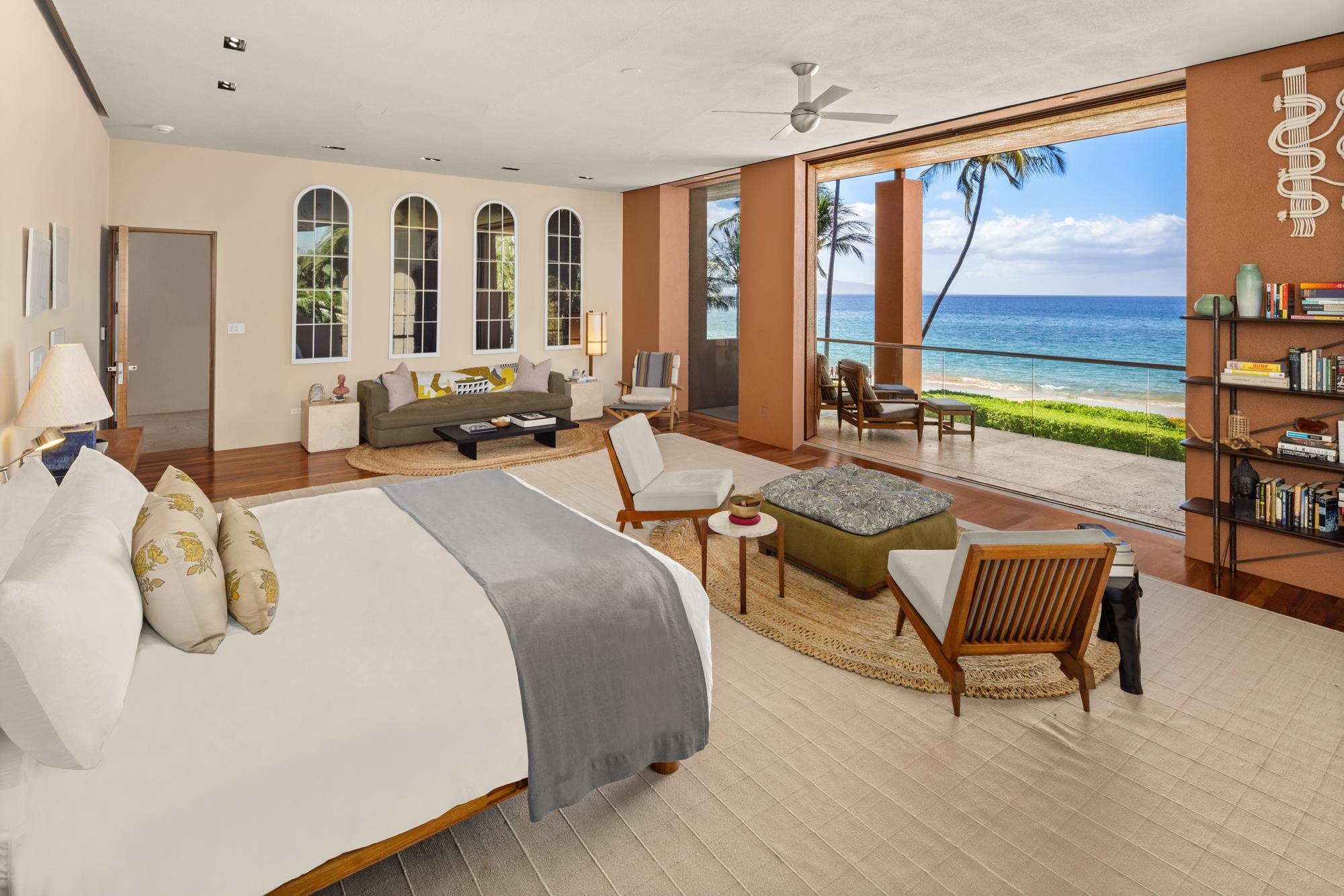 3200 South Kihei Road Kihei, HI 96753 - Photo 16 of 36 a spacious bedroom with a bed a couch and large window