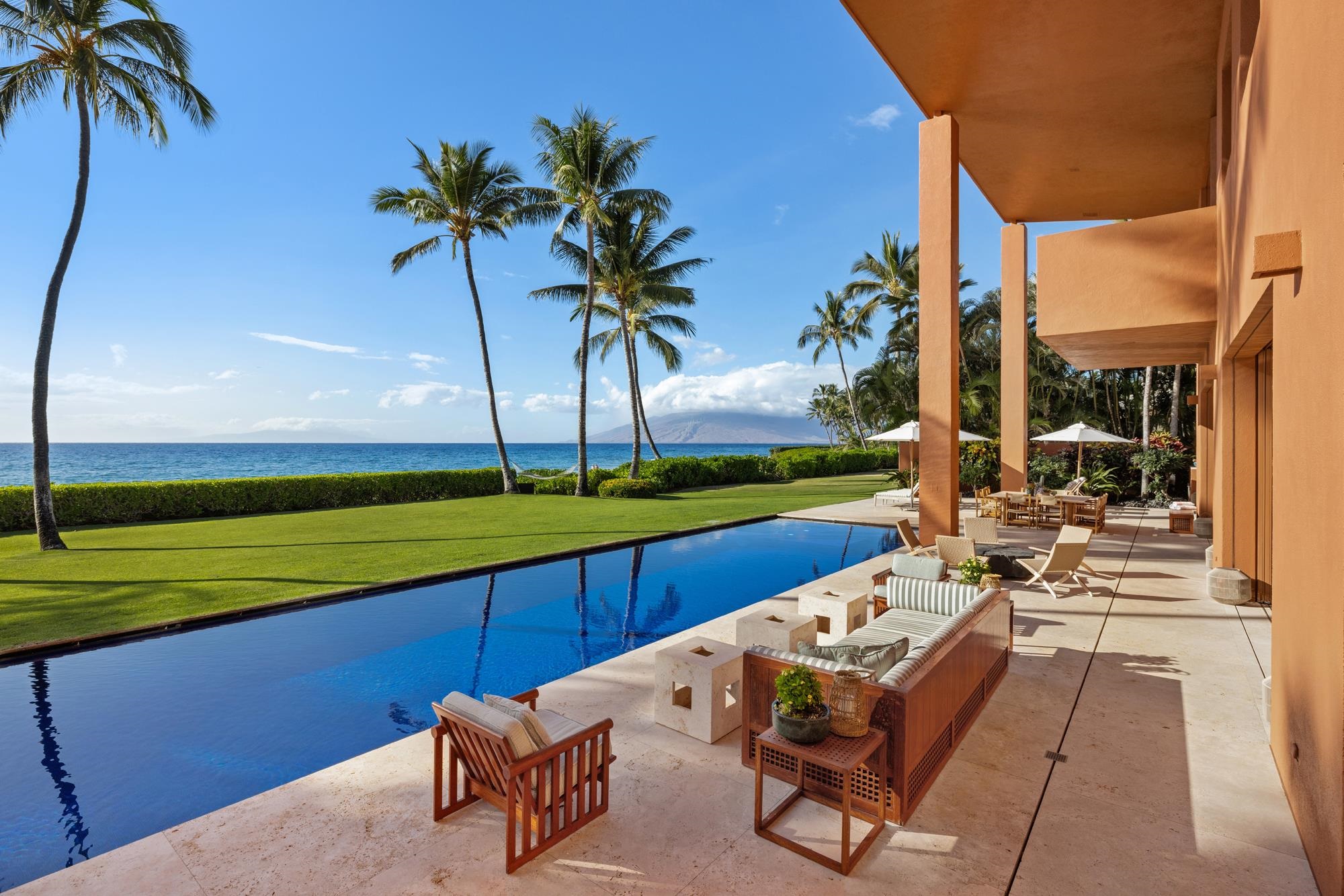3200 South Kihei Road Kihei, HI 96753 - Photo 3 of 36 a view of swimming pool with a table and chairs