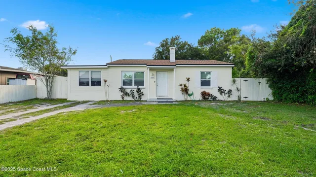 a view of swimming pool with a patio