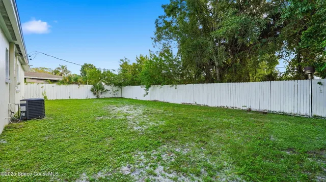 a house view with a garden space