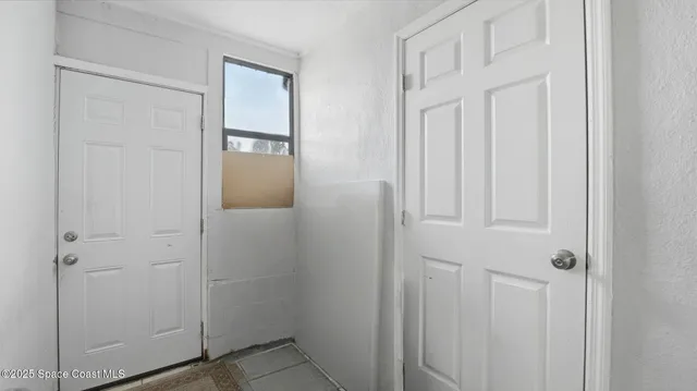 a front view of house with yard and outdoor seating