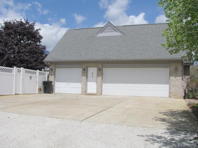 73555 Dequindre Road Leonard, MI 48367 - Photo 32 of 44 3-car garage w/ man door