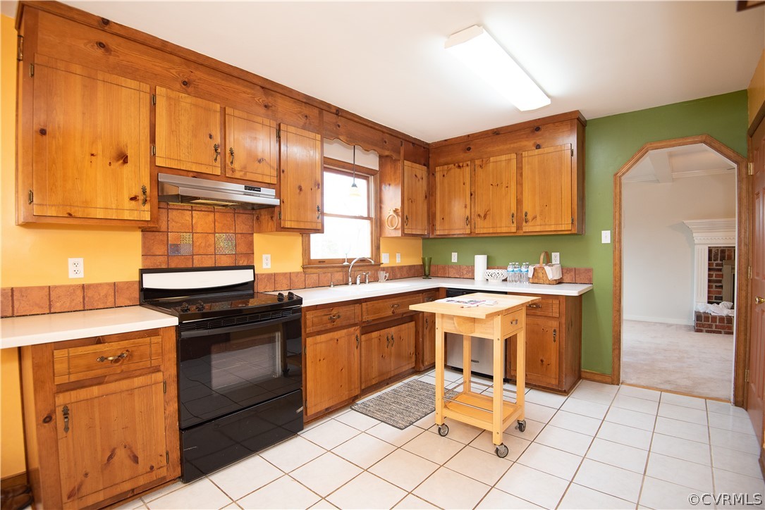 2312 Brookforest Road Midlothian, VA 23112 - Photo 23 of 39 a kitchen with a sink cabinets and window