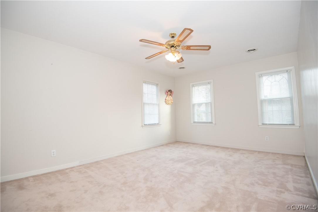 2312 Brookforest Road Midlothian, VA 23112 - Photo 27 of 39 an empty room with windows and fan