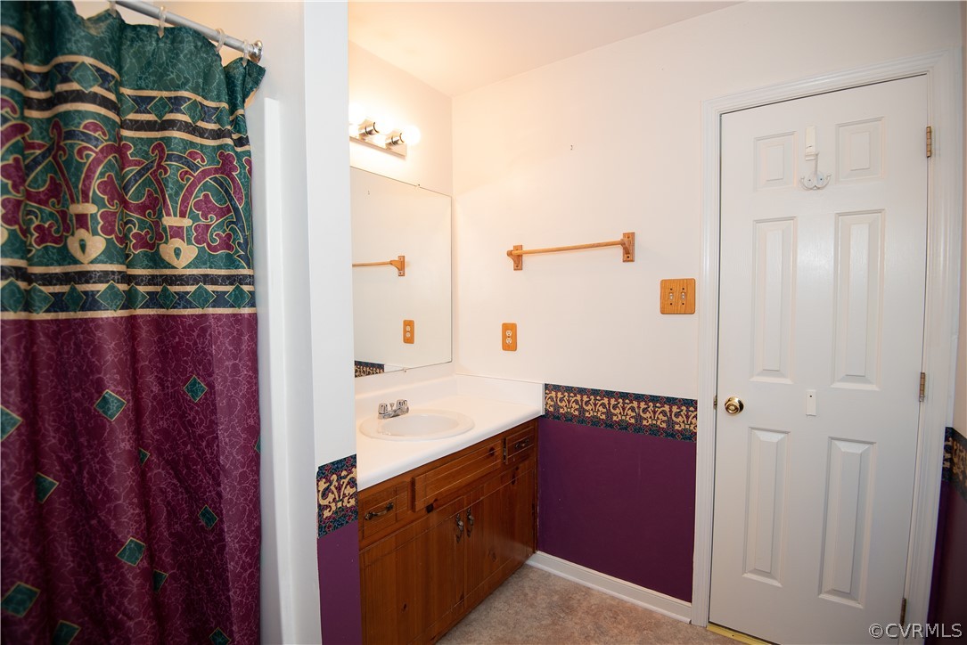 2312 Brookforest Road Midlothian, VA 23112 - Photo 30 of 39 a bathroom with a bathtub and a shower