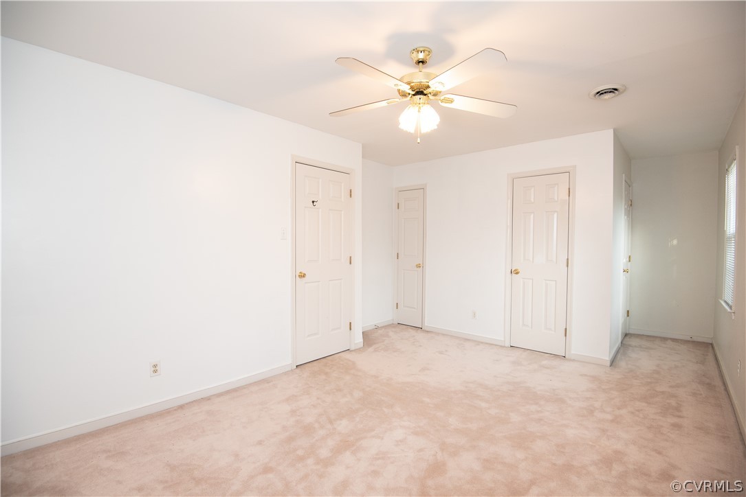 2312 Brookforest Road Midlothian, VA 23112 - Photo 33 of 39 an empty room with a fan and a fan