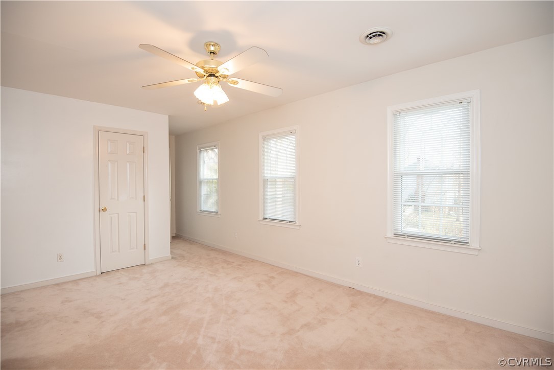 2312 Brookforest Road Midlothian, VA 23112 - Photo 34 of 39 an empty room with windows and fan