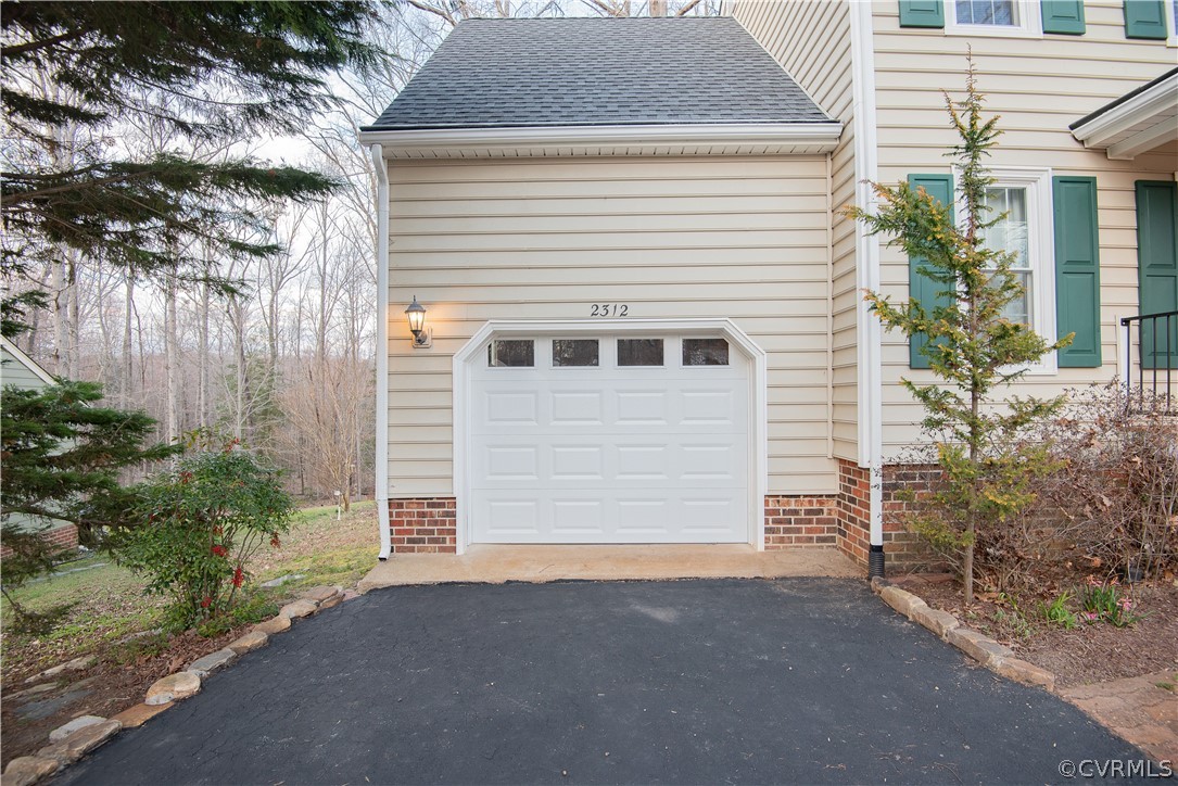 2312 Brookforest Road Midlothian, VA 23112 - Photo 5 of 39 a view of a house with a garage