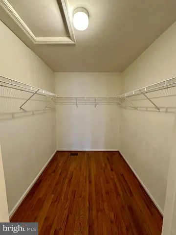 a view of a room with racks on the wall