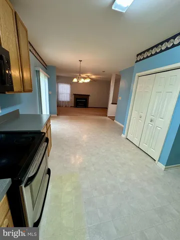 a view of kitchen and utility room