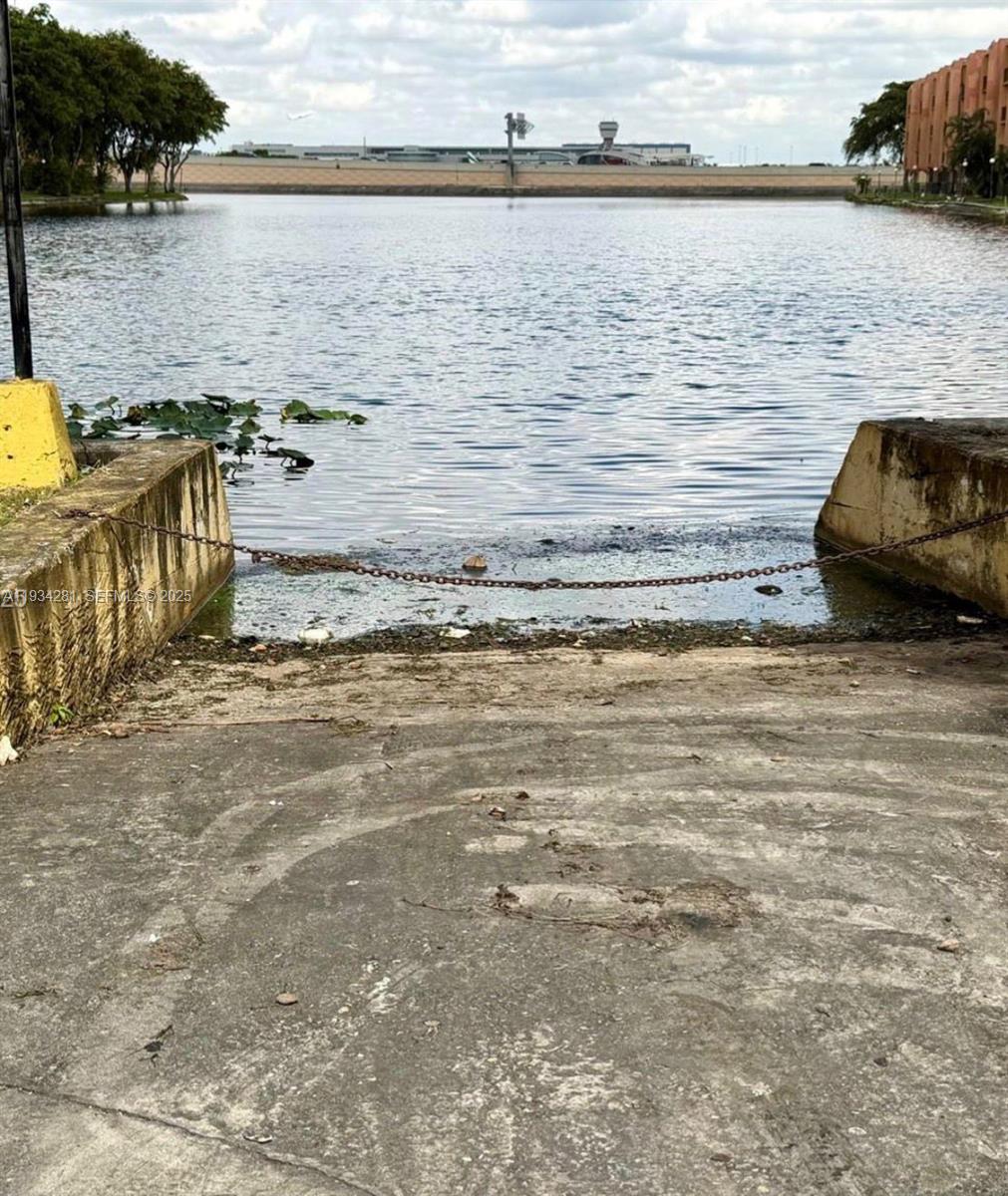 4803 Northwest 7th Street, Unit 21014 Miami, FL 33126 - Photo 14 of 15 a view of a lake view