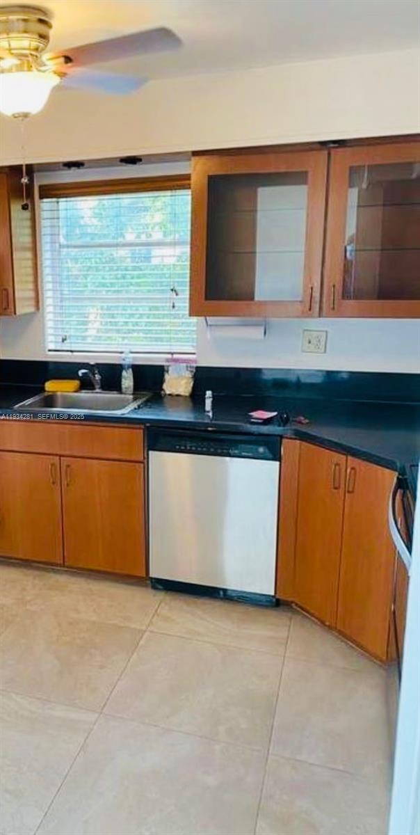 4803 Northwest 7th Street, Unit 21014 Miami, FL 33126 - Photo 8 of 15 a kitchen with stainless steel appliances granite countertop a stove a sink and a microwave