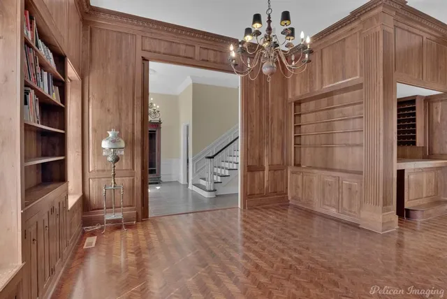 a view of an entryway with a chandelier