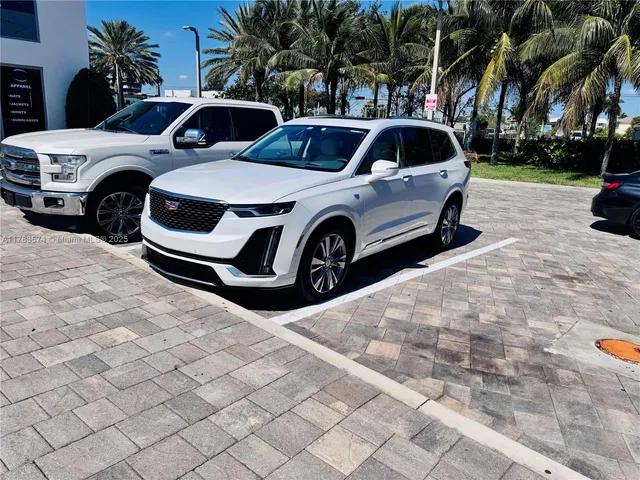 a view of a backyard with a sitting area